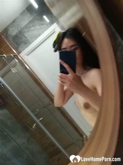 Perfect Asian Shows Off Her Tits At HomeMoviesTube