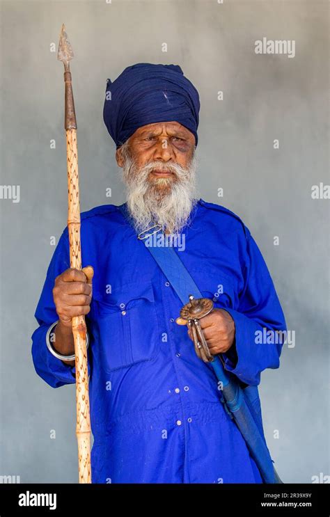 Portrait of a Sikh warrior in traditional dress with weapons Stock ...