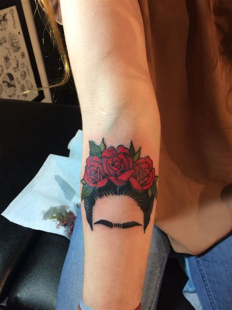 A Woman S Arm With Flowers On It