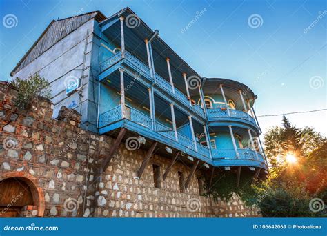 The Fortress Wall In Old Tbilisi And The Old Mansion Decorated With