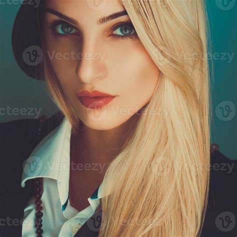 Square Portrait Of Sexual Blonde Woman In Studio Stock Photo