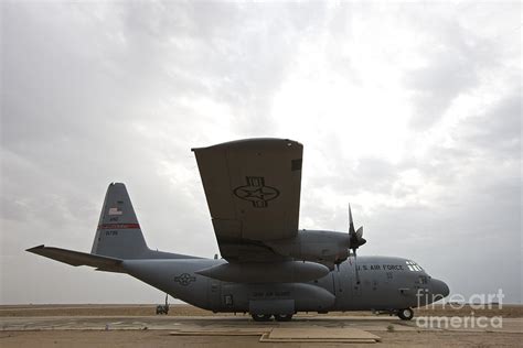 A U.s. Air Force C-130 Hercules Photograph by Terry Moore | Fine Art ...