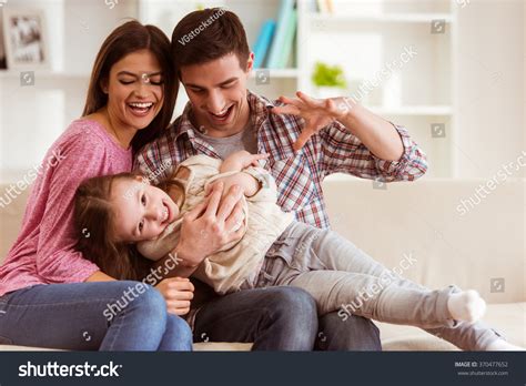 Smiling Young Parents Their Child Very Stock Photo 370477652 | Shutterstock