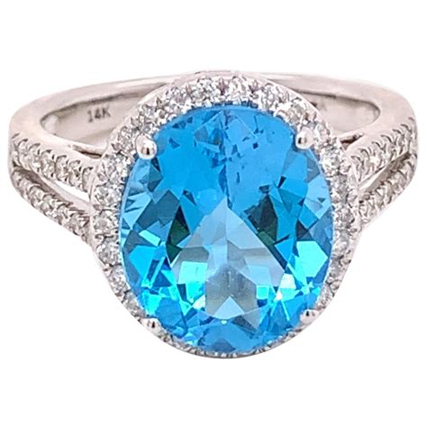 Blue Topaz And Diamond Halo Ring Oval Blue Topaz White Gold And