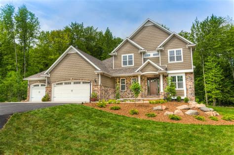 Taupe Siding With Stone Accents Craftsman Style Exterior House