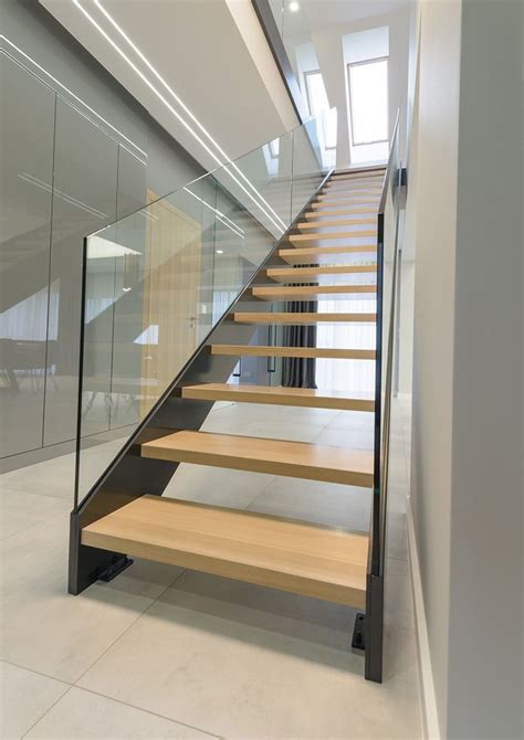 The Stairs Are Made Of Wood And Glass