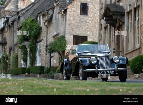 1955 Vintage Mg Tf 1500 Car Parked Outside Houses In The Medieval Town