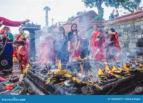 Hindu Women Offer Prayers At The Pashupatinath Temple During Teej