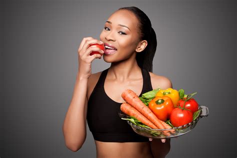 Woman Eating Vegetables