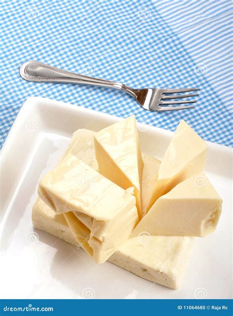 Cheese with fork stock photo. Image of product, cheddar - 11064680