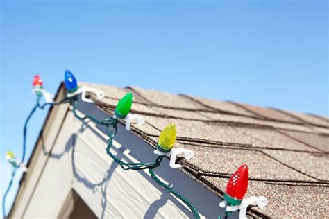 How To Hang Christmas Lights On Roof Peak Betty S Christmas House