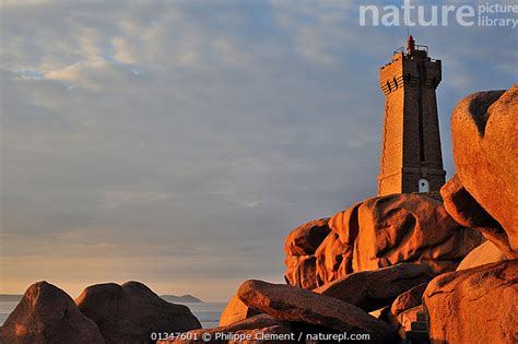 Stock Photo Of The Pors Kamor Lighthouse At Sunset Along The Cote De