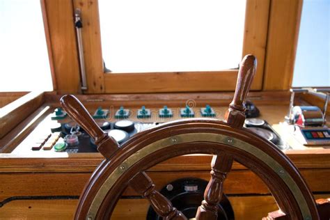 Wooden Rudder Of A Flat Bottomed Ship At The Back Of A Boat Stock Photo