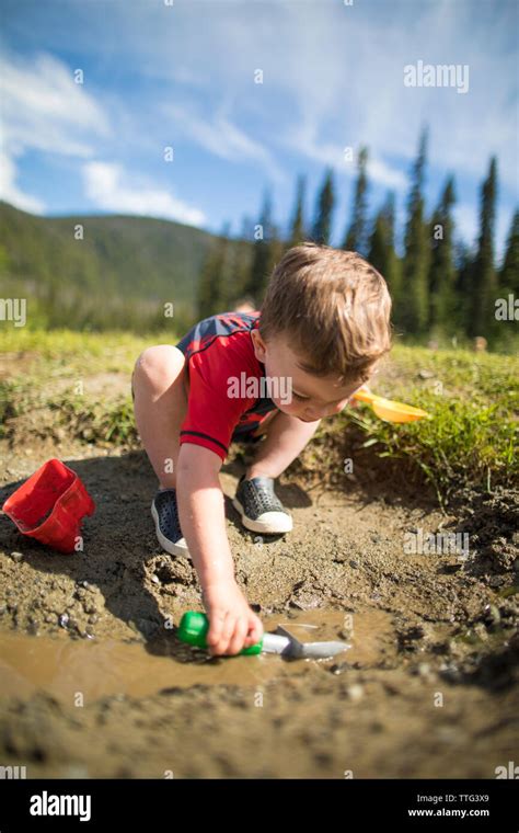 Boy Swim Water Muddy Hi Res Stock Photography And Images Alamy