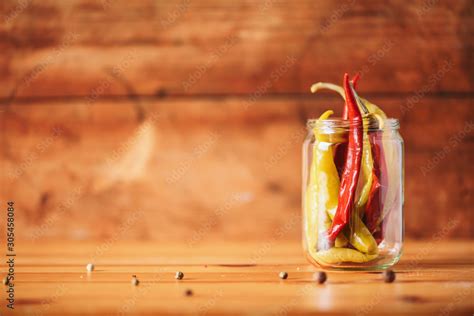 Probiotics Food Background Pickled Hot Pepper Chili In Glass Jars On