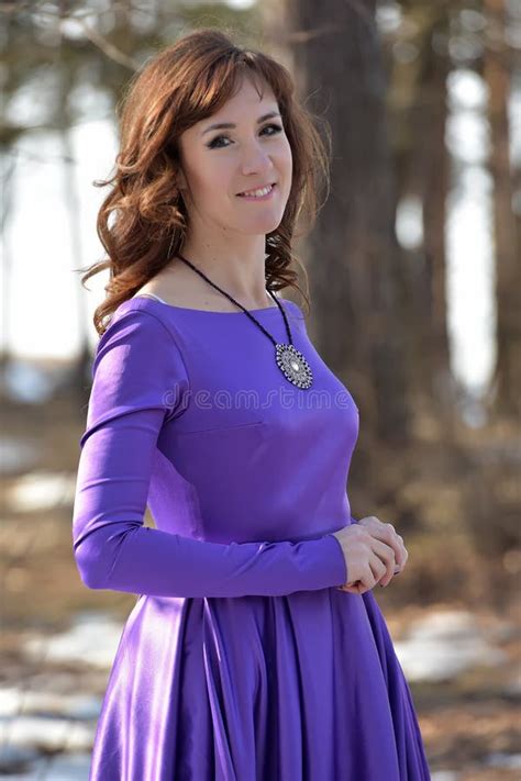 Portrait Of A Brunette In A Violet Dress Stock Image Image Of Dress Clothing 70604811