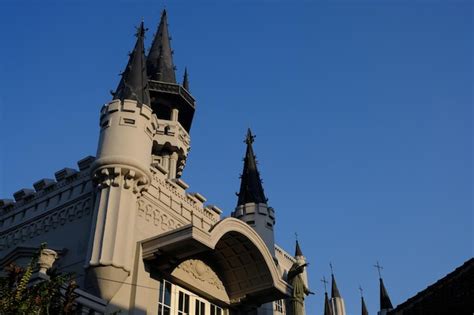 Premium Photo A Castle With A Cross On The Top