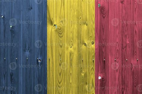 Chad Flag Depicted In Bright Paint Colors On Old Wooden Wall Textured