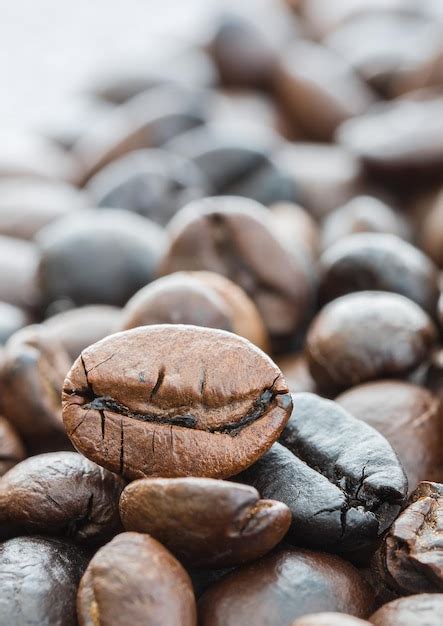 Premium Photo Heap Of Roasted Brown Coffee Beans