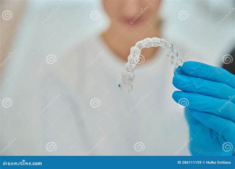 Stomatologist Holding Invisible Removable Aligners For Teeth