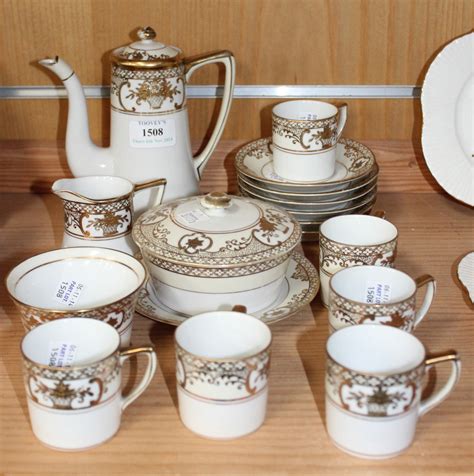 A Noritake Porcelain Coffee Set Comprising Coffee Pot Cream Jug