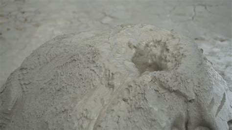 Premium Stock Video Exceptional Macro View Of Bubbling Mud Crater Of