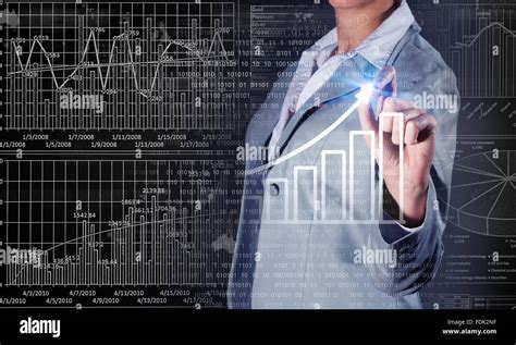 Chest View Of Businesswoman Drawing Infographs On Digital Screen Stock