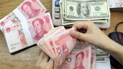 Chinese Yuan Strengthens To 7 1406 Against The Dollar