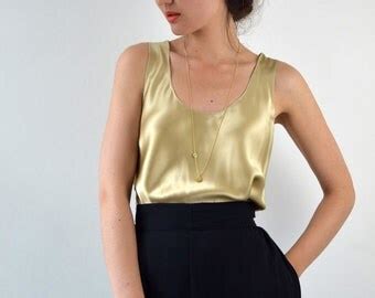 Popular items for gold silk blouse on Etsy