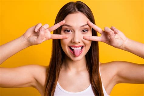 Premium Photo Beautiful Brunette Posing Isolated On Orange