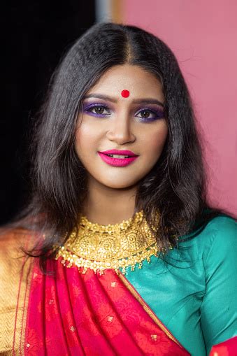 Portrait Of Beautiful Smiling Indian Woman Stock Photo Download Image