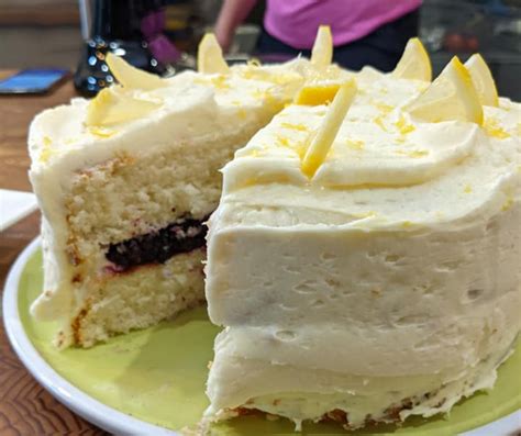 Lemon Cake With Wild Blueberry Sauce And Citrus Buttercream Canadian