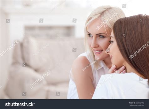 Loving Lesbian Couple Is Relaxing At Home They Are Sharing Their Love And Smiling Copy Space