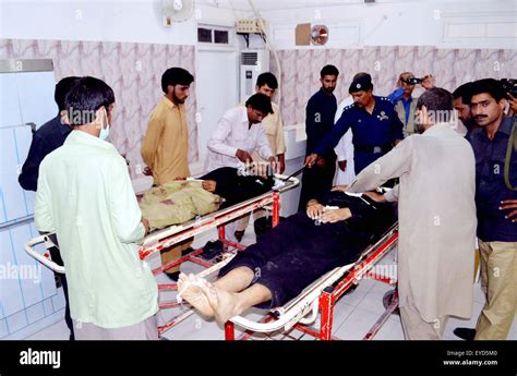 Paramedical Staffs And People Gather Near Police Officials Dead Bodies