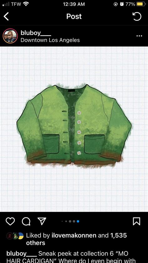 An Image Of A Green Jacket With Buttons On The Front And Back Which