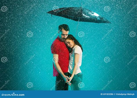 The Loving Couple In The Rain Stock Photo - Image of lover, couple: 69183286