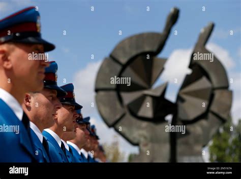 A Serbian Military Honor Guard Pay Homage To The Victims Of The