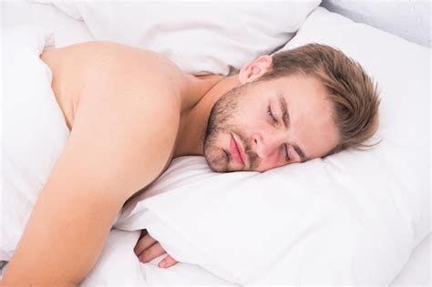 Premium Photo Man Handsome Unshaven Guy In Bed Tips Sleep Better