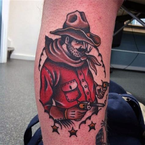 Old school colored western cowboy tattoo on leg - Tattooimages.biz