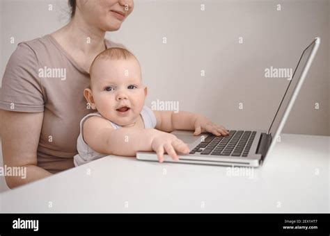 Little Boy Sitting On Mothers Lap Hi Res Stock Photography And Images