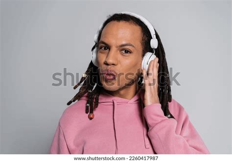 Multiracial Man Dreadlocks Pouting Lips While Stock Photo