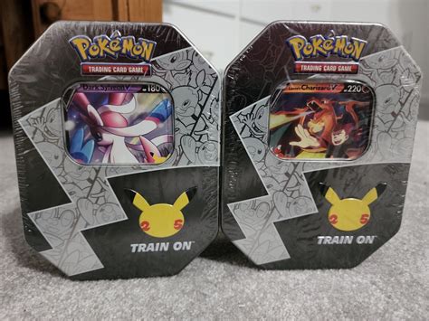 Pok Mon Th Anniversary Celebrations Tin Set Lance S Charizard V Dark