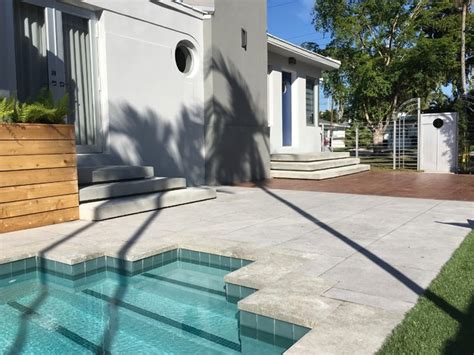 Floating Steps And Porcelain Tile Pool Deck Modern Patio Miami