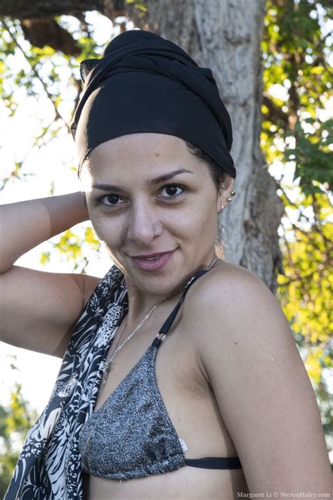 Naughty Brunette Margaret Li Shows Her Hairy Pussy All Nude Outdoors