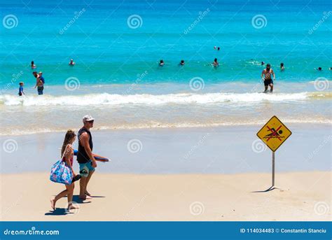 People Enjoying The Sunny Weather On The Beach At Byron Bay NSW