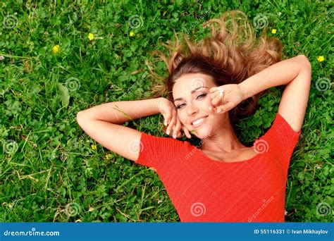 Young Woman In Red Dress Lying On Grass Stock Image Image Of Happy