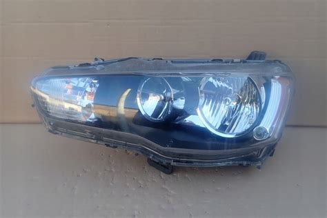 Lampa Lewa Reflektor Mitsubishi Lancer X