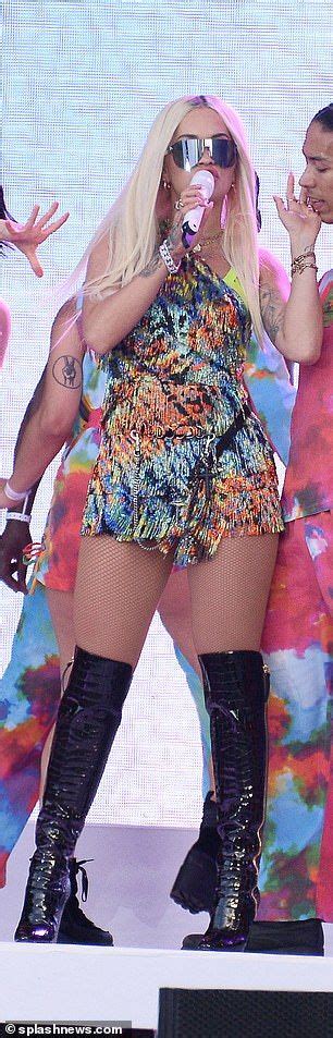 Rita Ora Dazzles The Crowd In A Rainbow Playsuit And Thigh High Boots