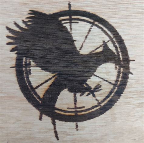 The Hunger Games Mockingjay Logo Laserski Gravirano