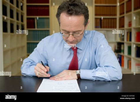 Mr Lawer Designing A Contract In The Office Stock Photo Alamy
